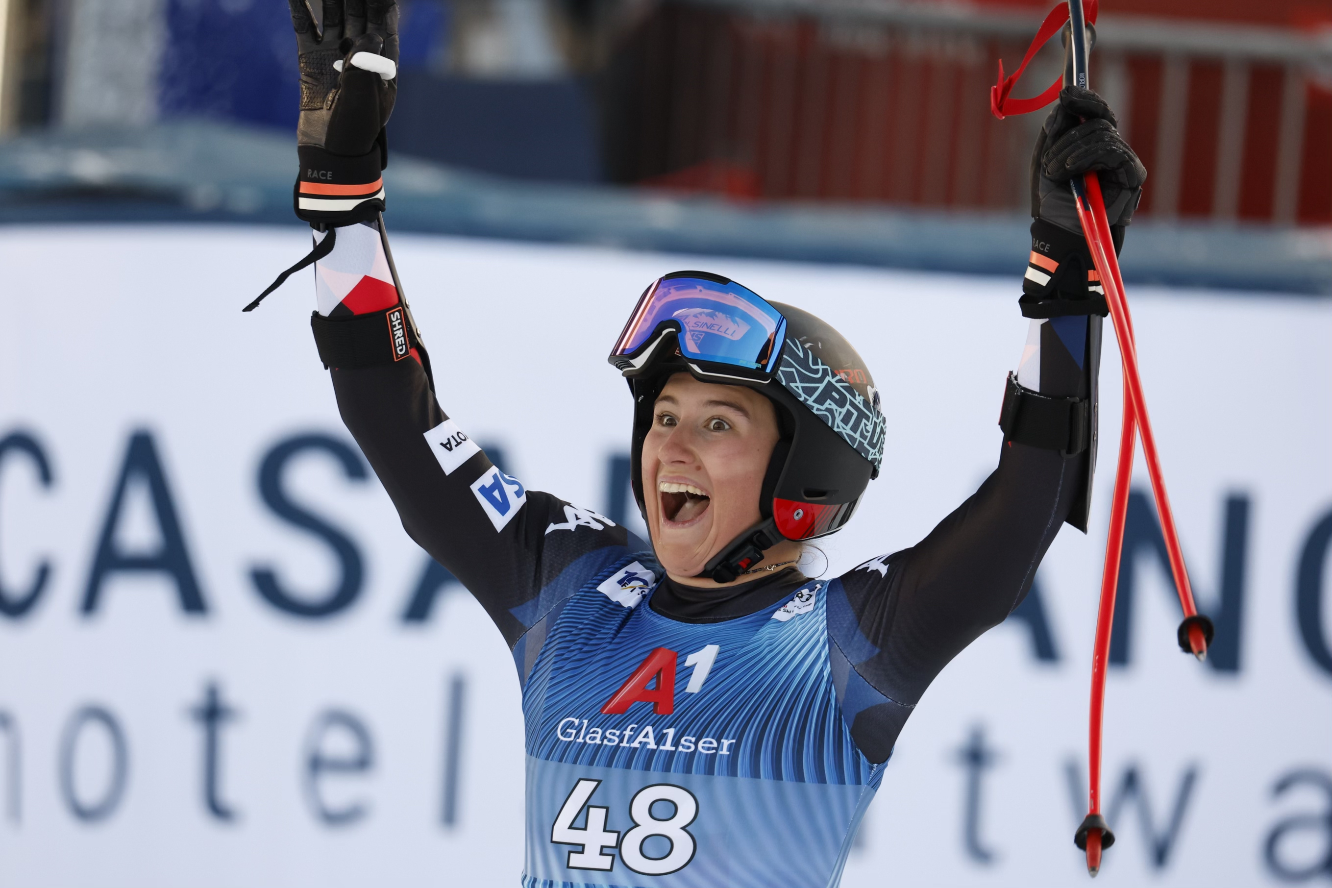 Lauren Macuga celebrates in the finish.