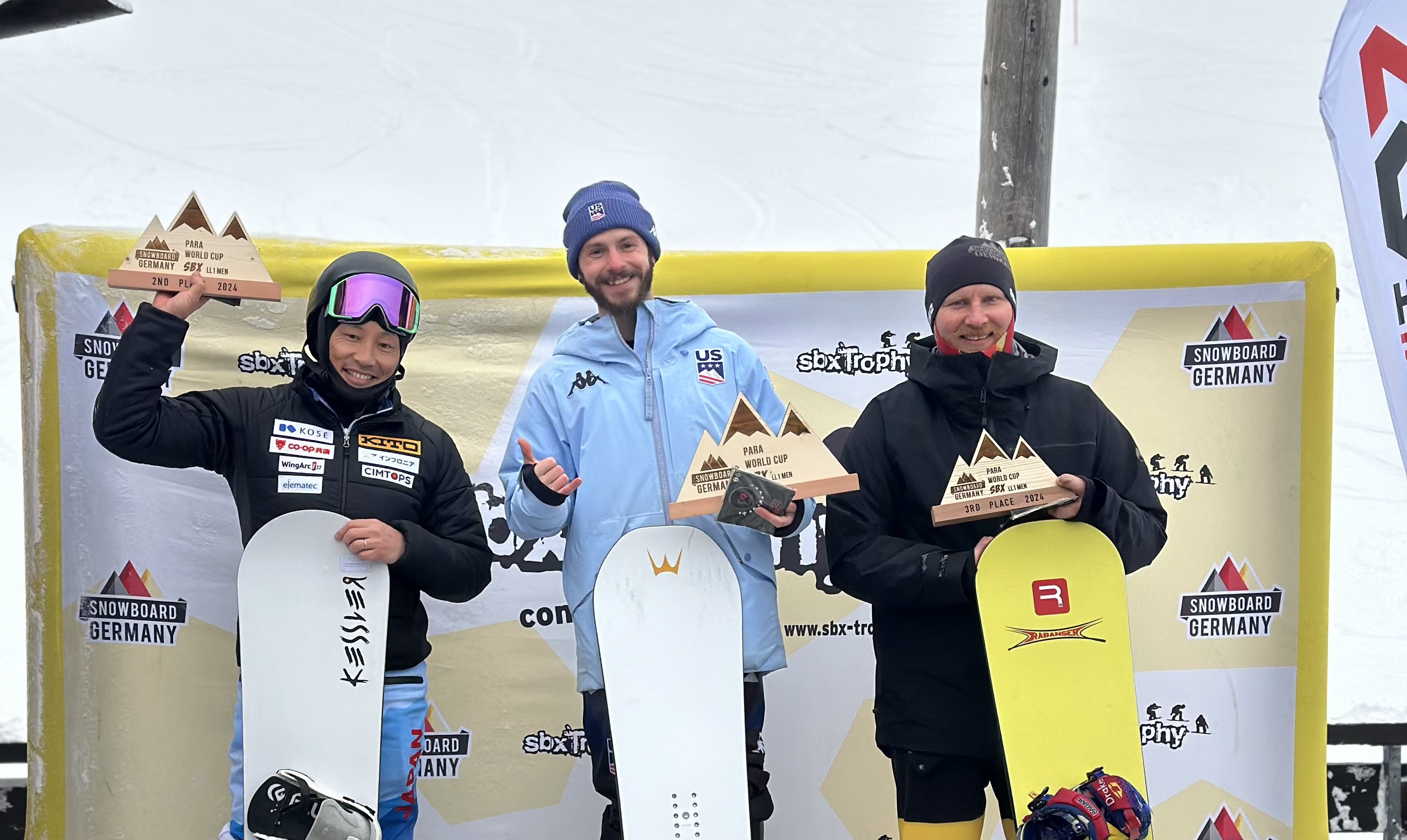 Noah Elliott stands atop the podium in Grasgehren, Germany