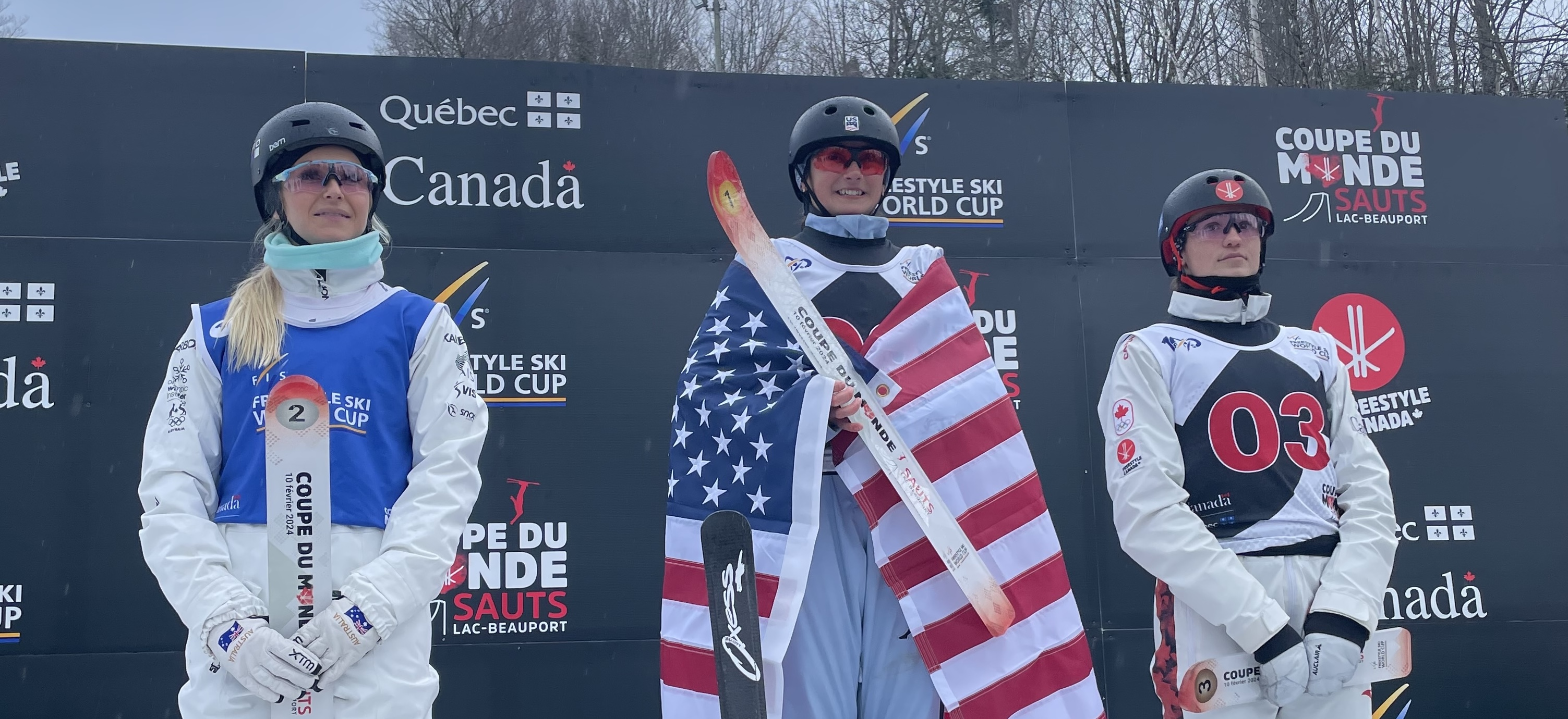 Karenna Elliott stands on the top box of the podium in Lac-Beauport, Canada.