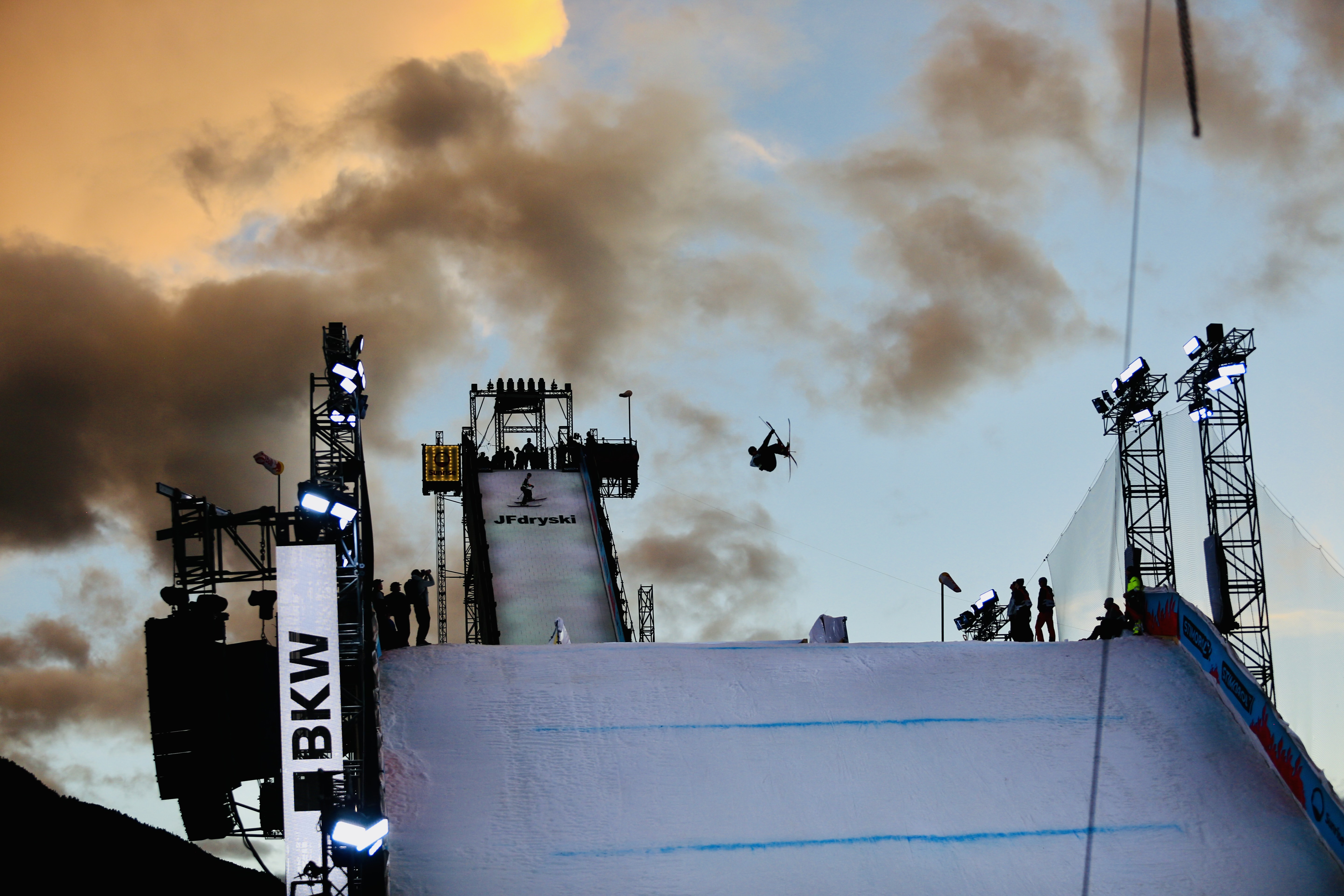 Troy Podmilsak Troy Podmilsak in mid-air during Big Air training at sunset in Chur, Switzerland