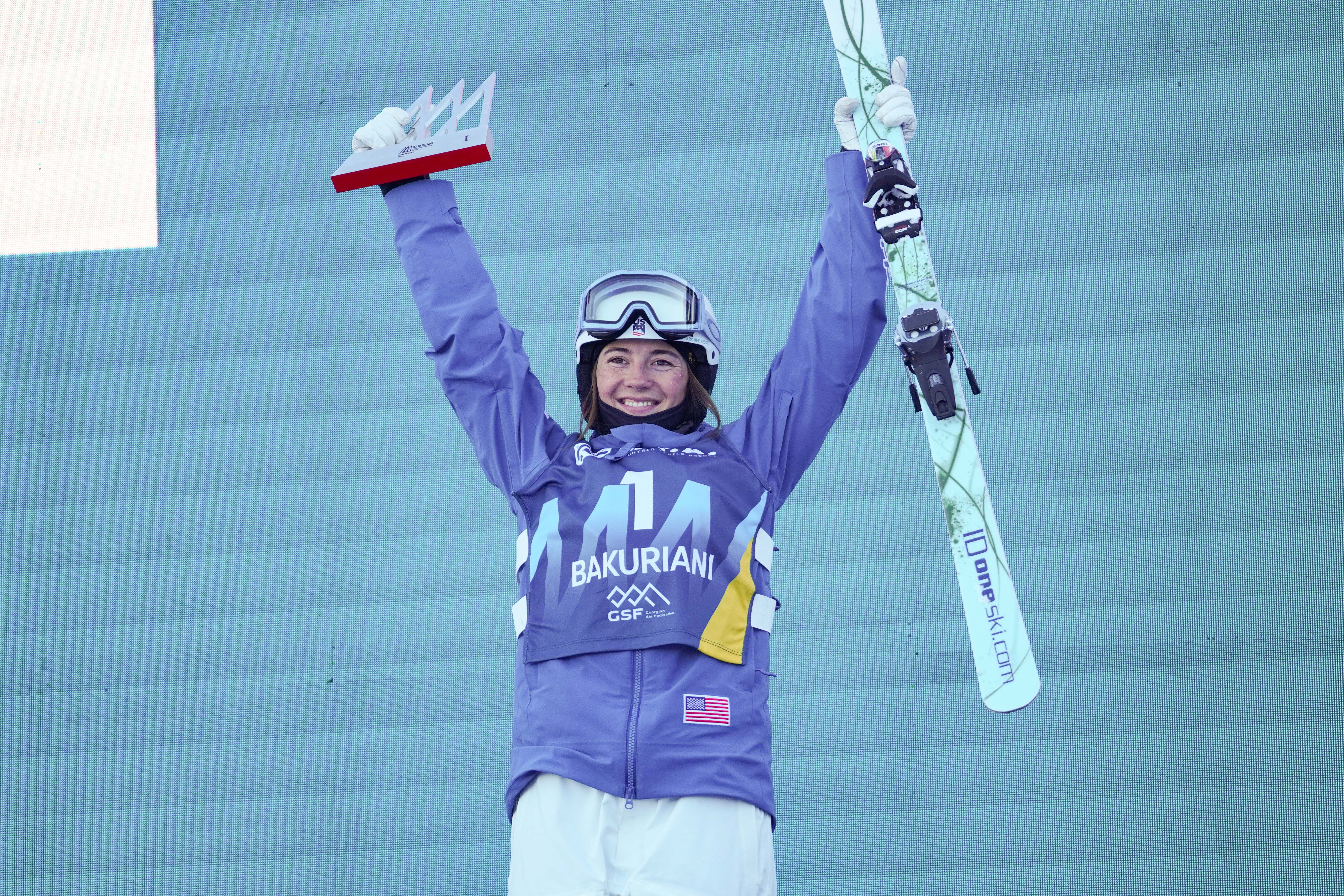 Jaelin Kauf smiles on the podium in Bakuriani