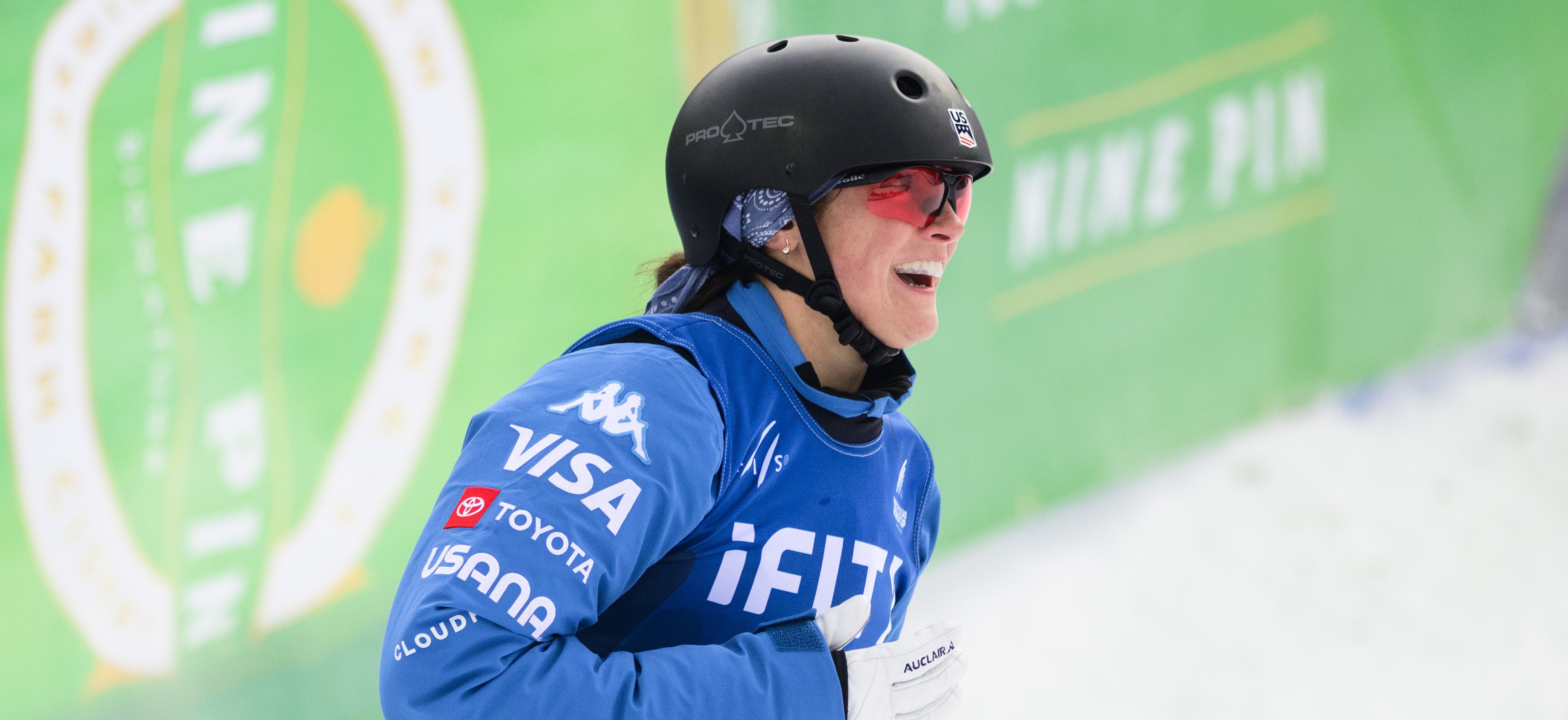 Karenna Elliott excited in the finish after her jump in Lake Placid New York
