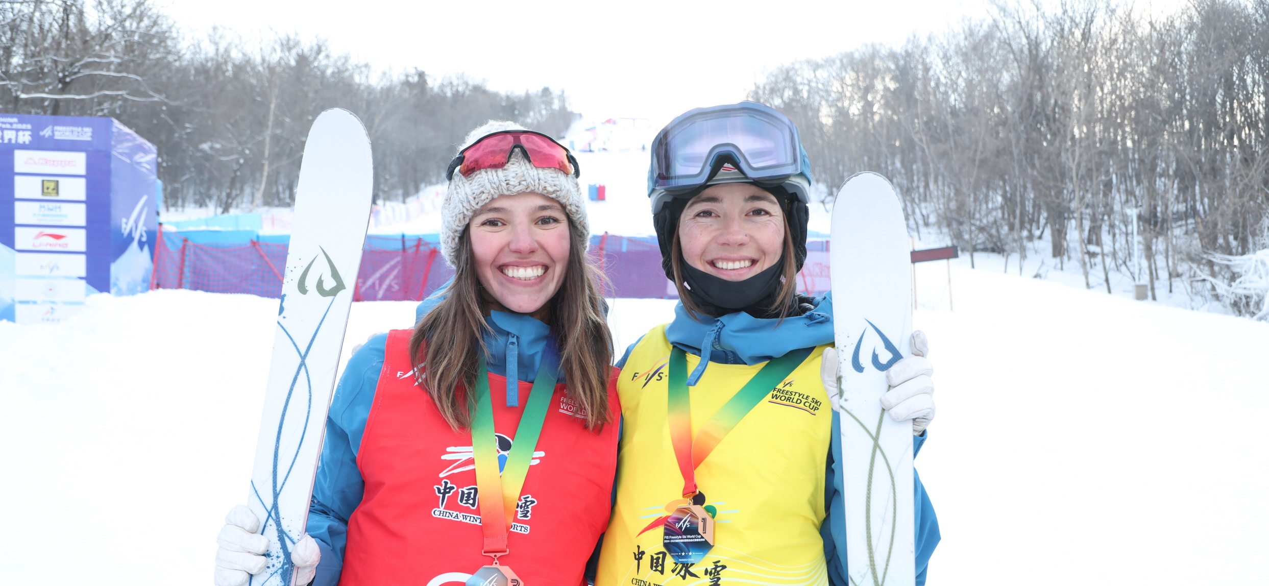 Jaelin Kauf and Tess Johnson smile after awards in Beidahu