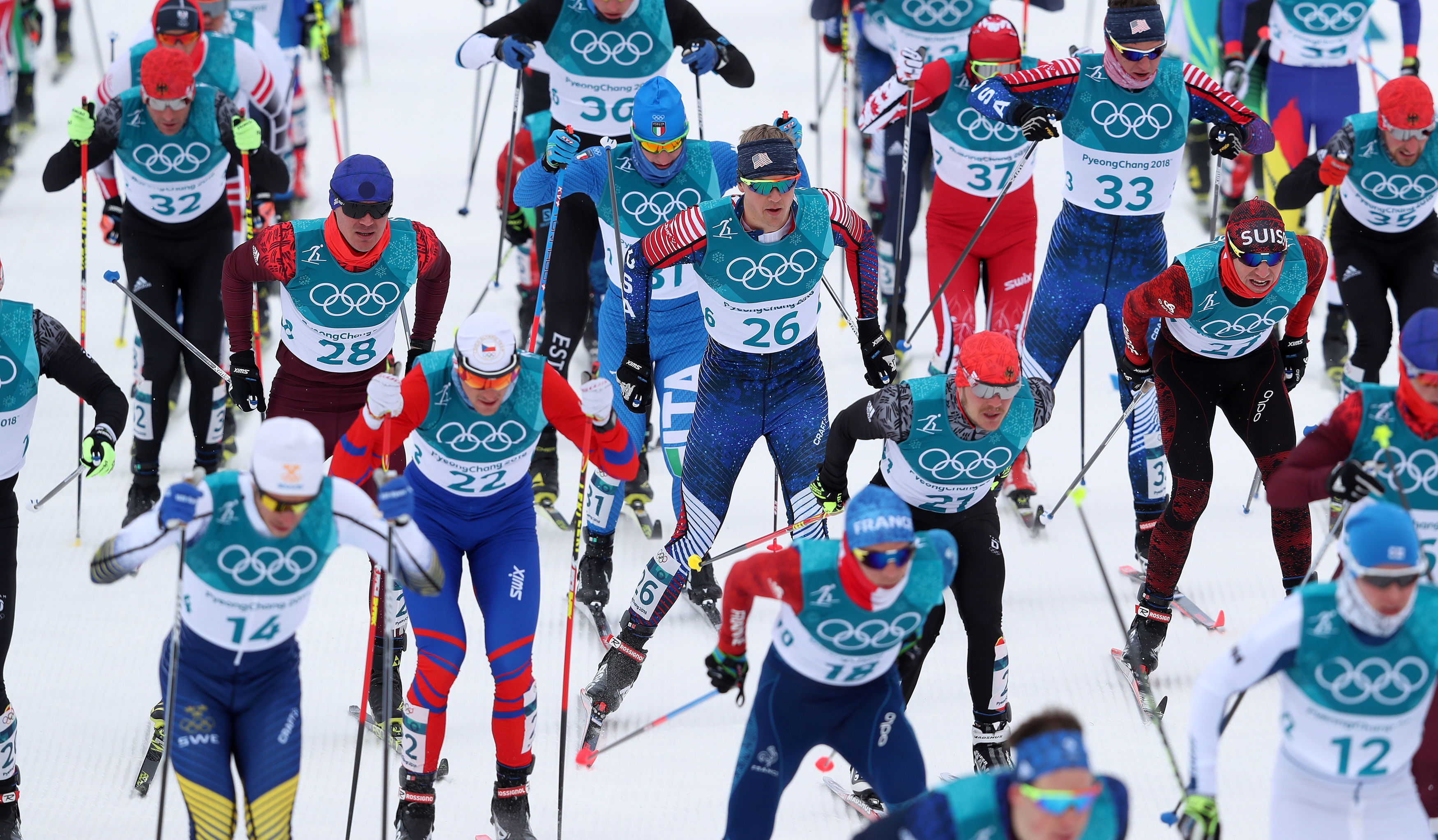 Erik Bjornsen (bib 33) in the middle of the mass start of the skiathlon at the Alpensia Cross Country Skiing Centre during day two of the 2018 Olympic Winter Games in South Korea. (Getty Images/PA Images - David Davies)
