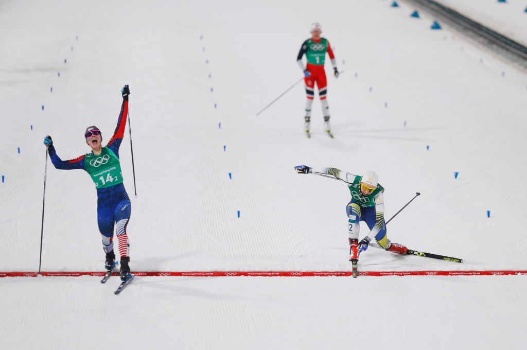 Diggins Jessica crosses the finish line ahead of Sweden’s Stina Nilsson to win Gold in the team sprint. (Photo by Nils Petter Nilsson/Getty Images)