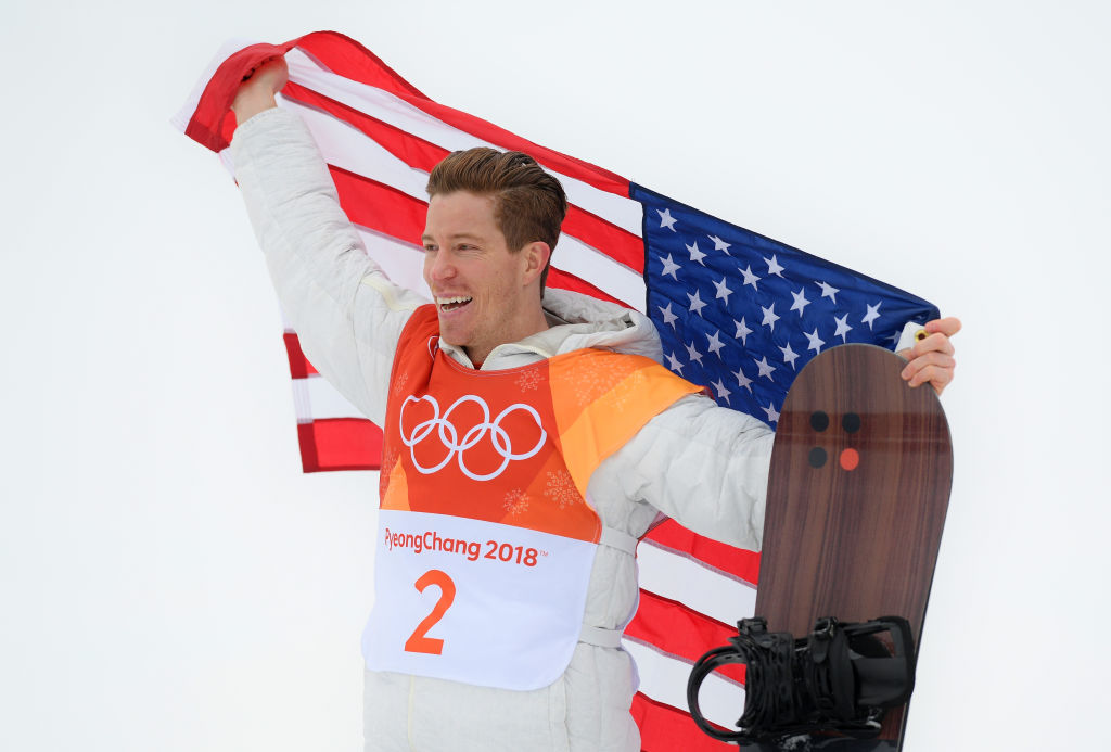 Shaun White smiles after winning his third Olympic halfpipe gold at Phoenix Snow Park Wednesday. (Getty Images - David Ramos)