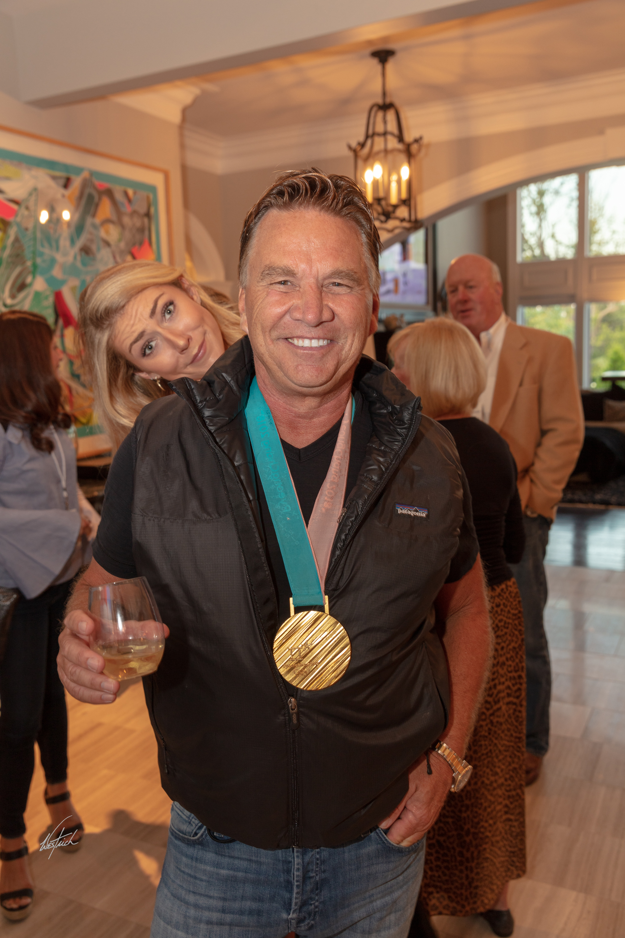 Mikaela goofs off while Ron sports PyeongChang gold