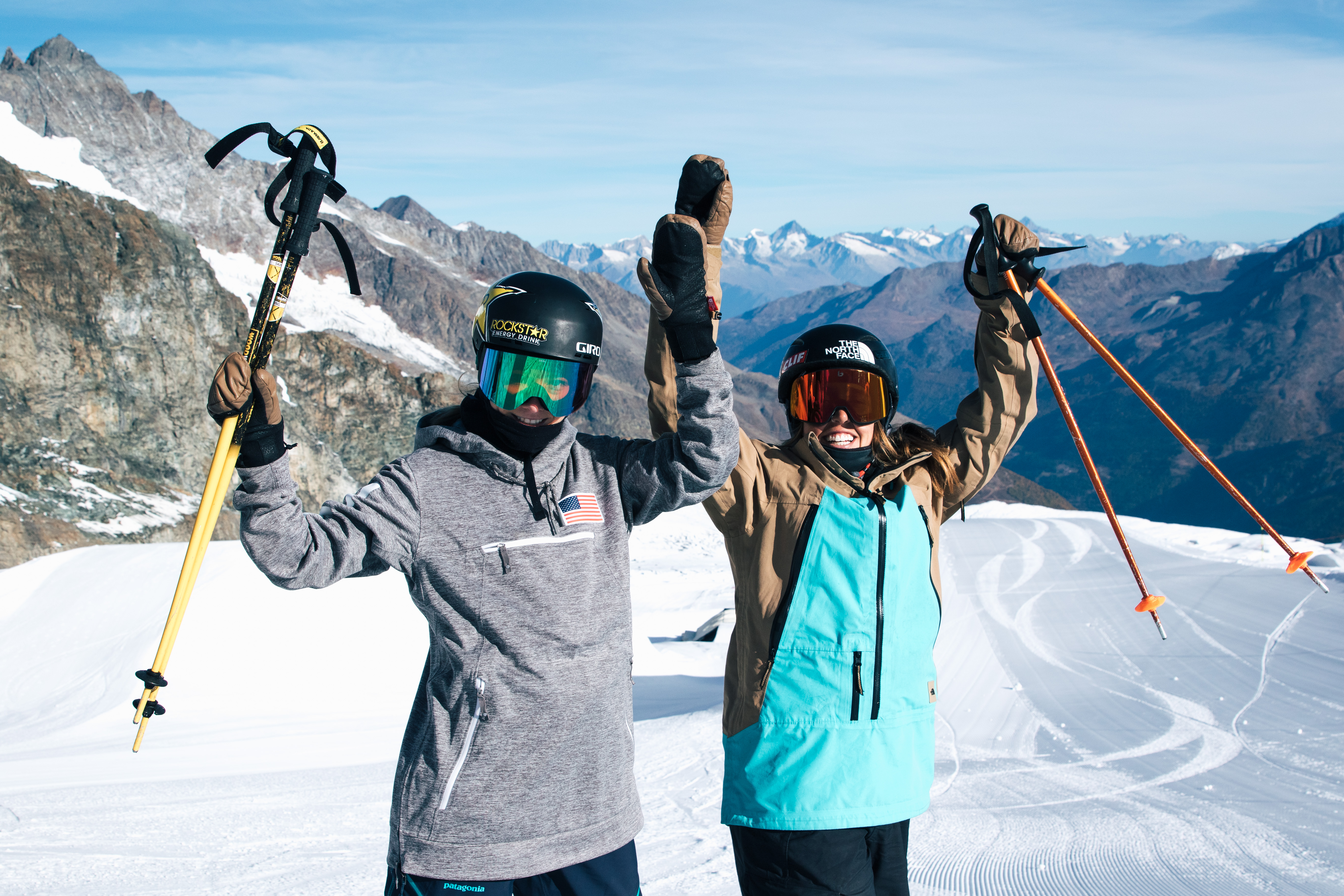 Brita Sigourney and Maddie Bowman celebrating another good day on the glacier (The Stomping Grounds Park). Brita Sigourney and Maddie Bowman at Switzerland Training Camp.