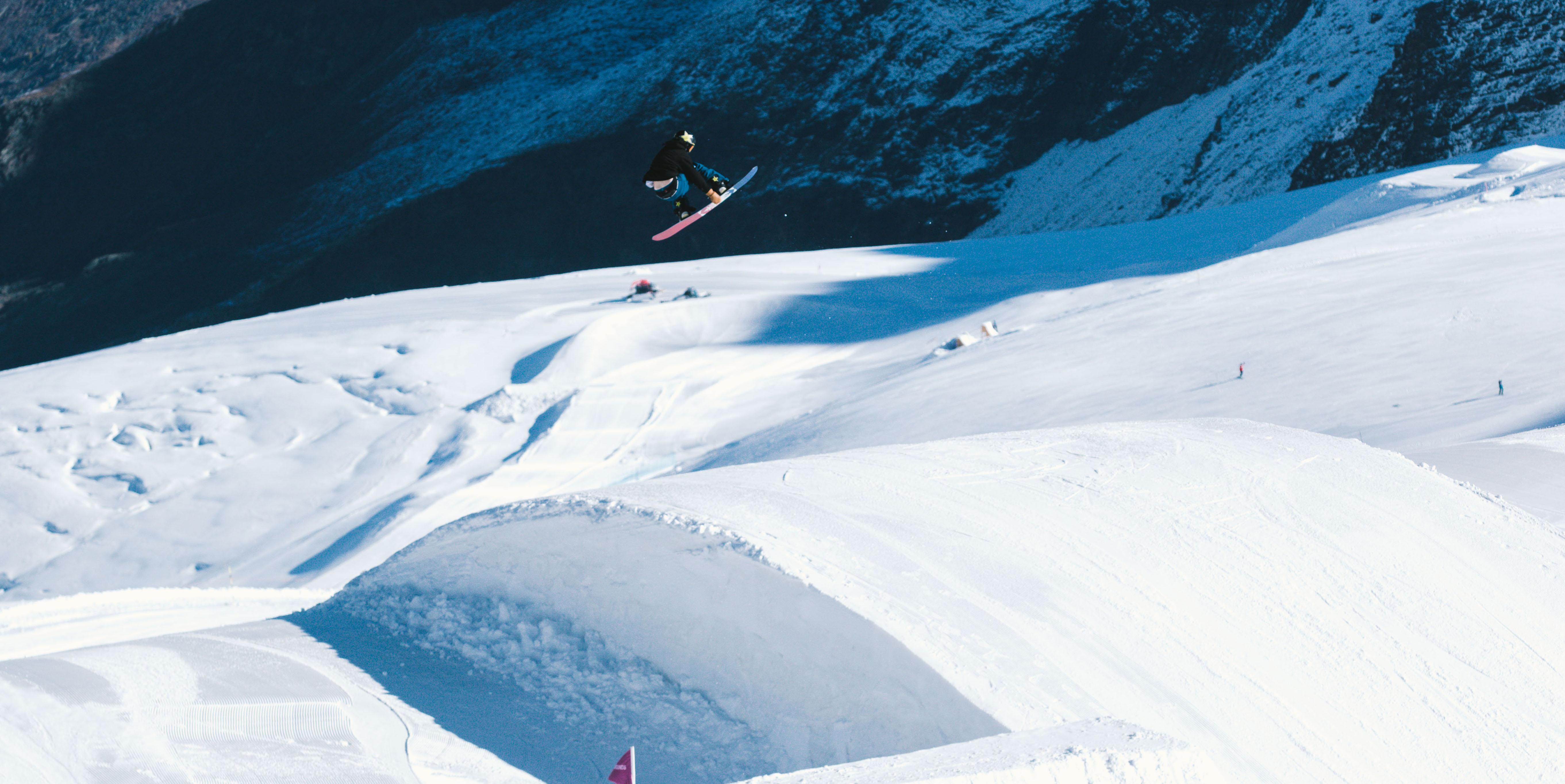 Chris Corning getting his repetitions in at Saas-Fee Camp (The Stomping Grounds Park). Chris Corning airborne on the slopestyle course in Switzerland.