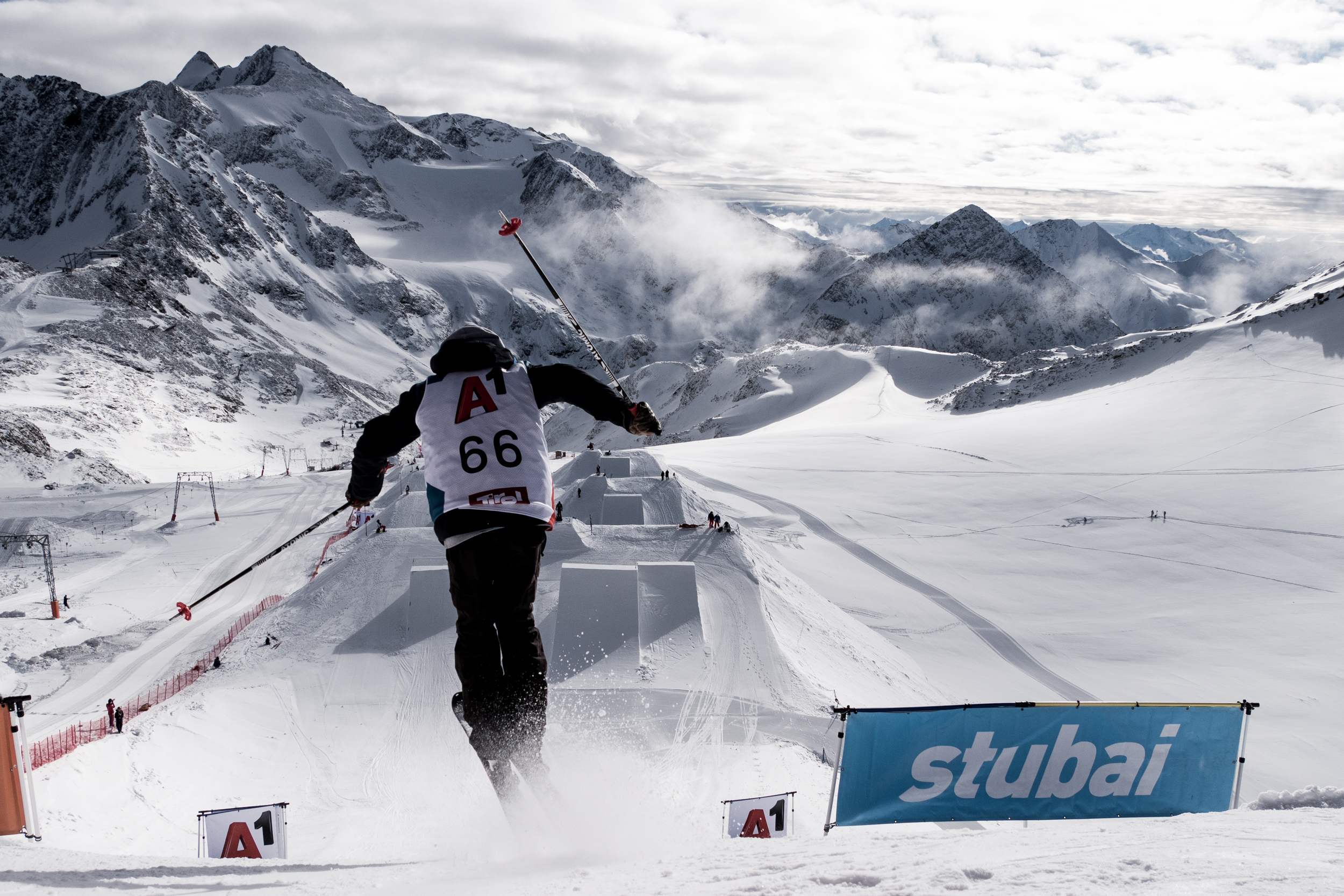 Dropping into training in Stubai, Austria. (Mateusz Kielpinski/FIS Freestyle) athlete about to complete his run in Stubai.