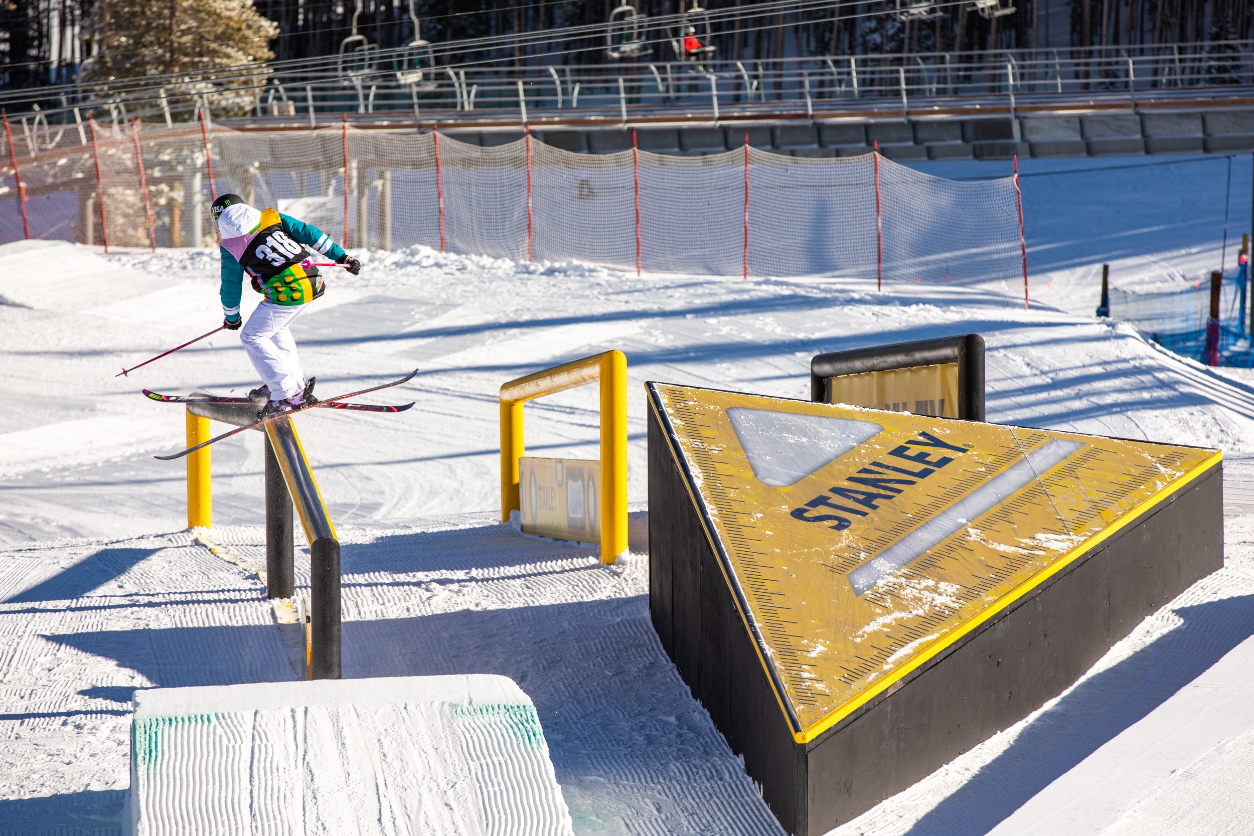 Maggie Voisin sliding a rail.