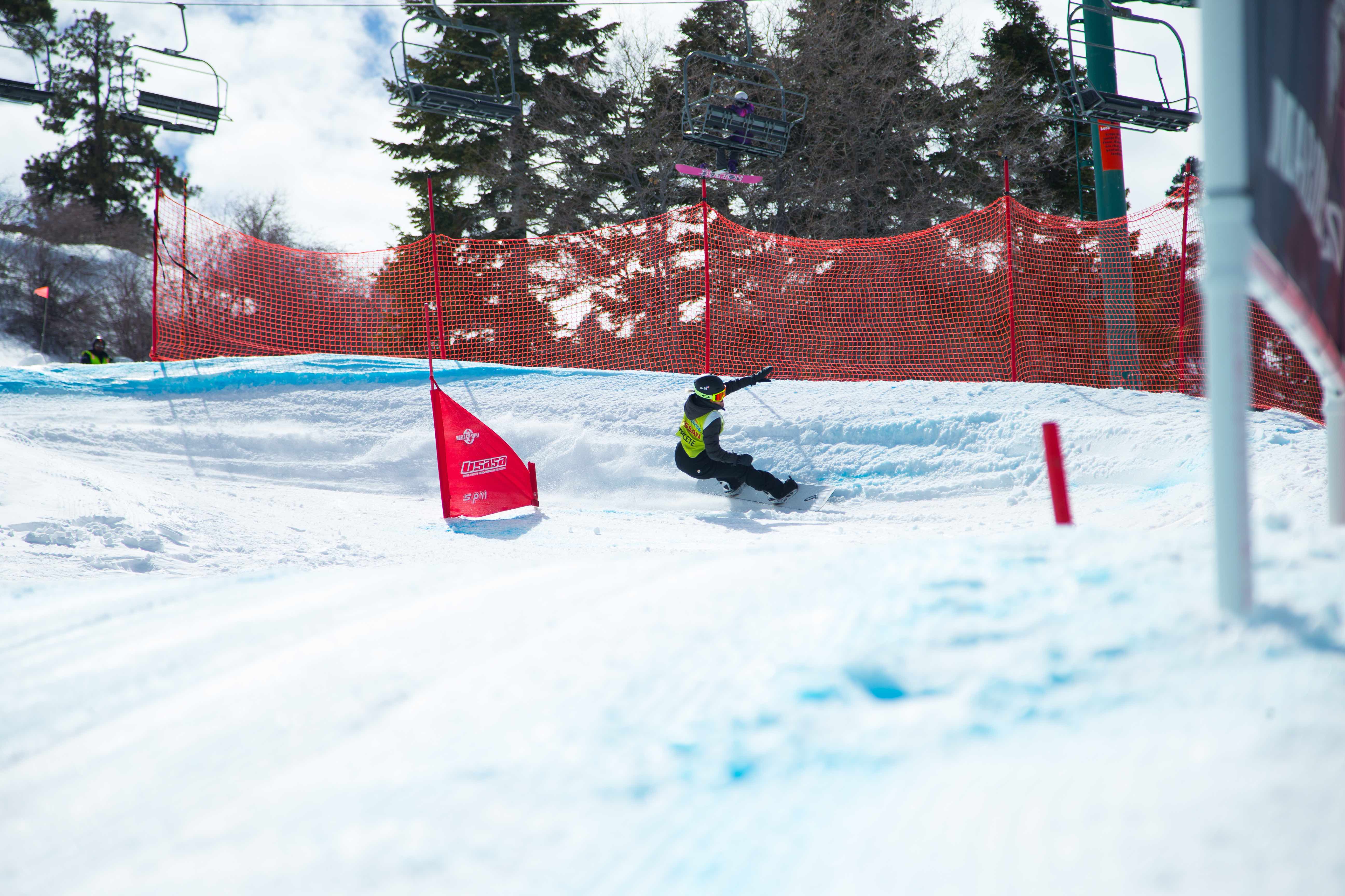 Supergirl Snow Pro competitor in the snowboardcross competition. (Supergirl Snow Pro) Supergirl Snow Pro