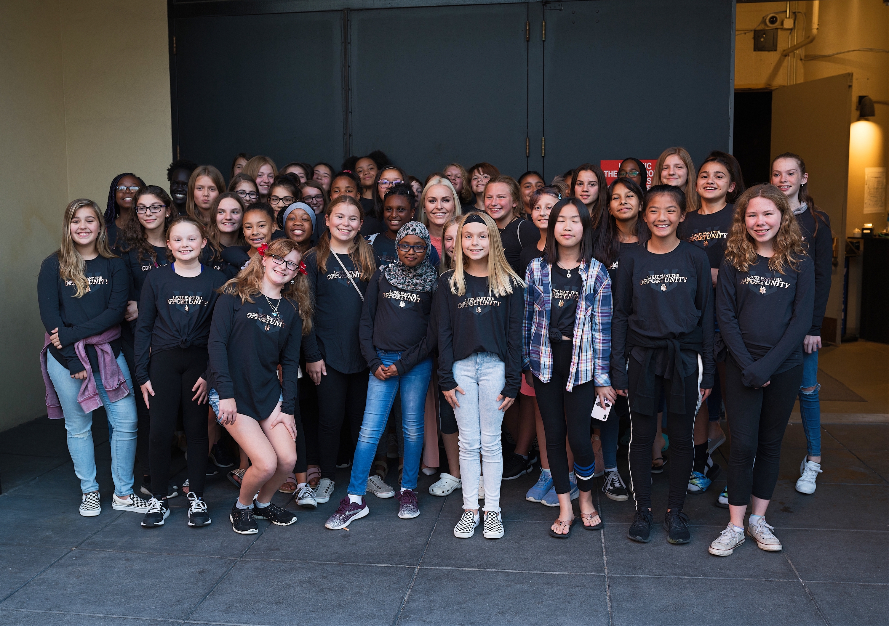 Lindsey poses with fans