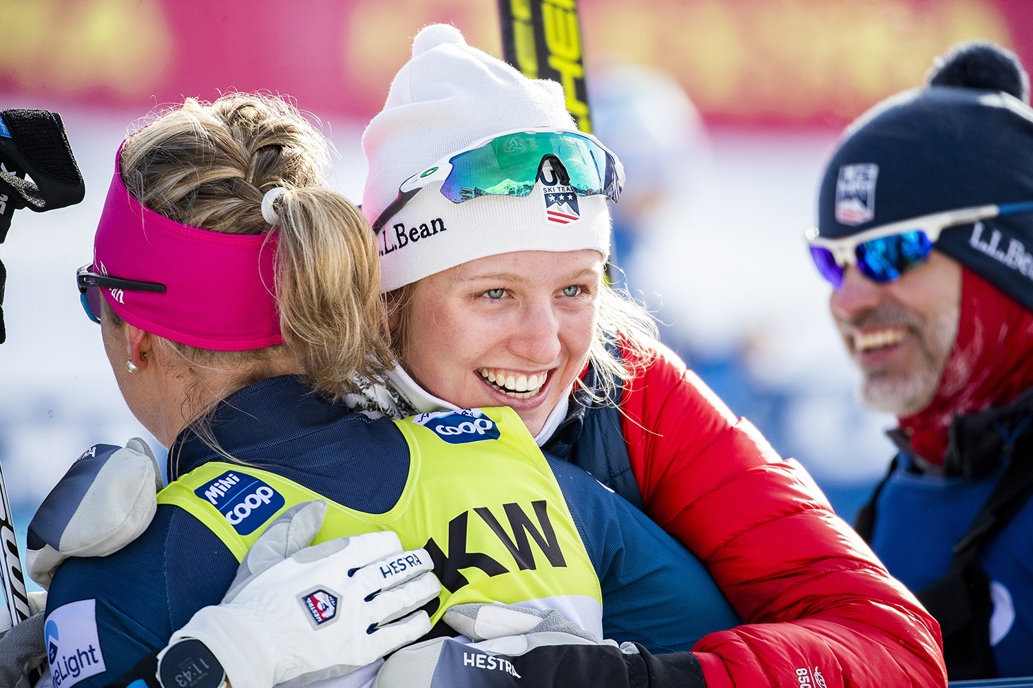 Hailey Swirbul embraces her teammate Sadie Maubet Bjornsen after finishing the women's 10k freestyle individual start World Cup in Davos.