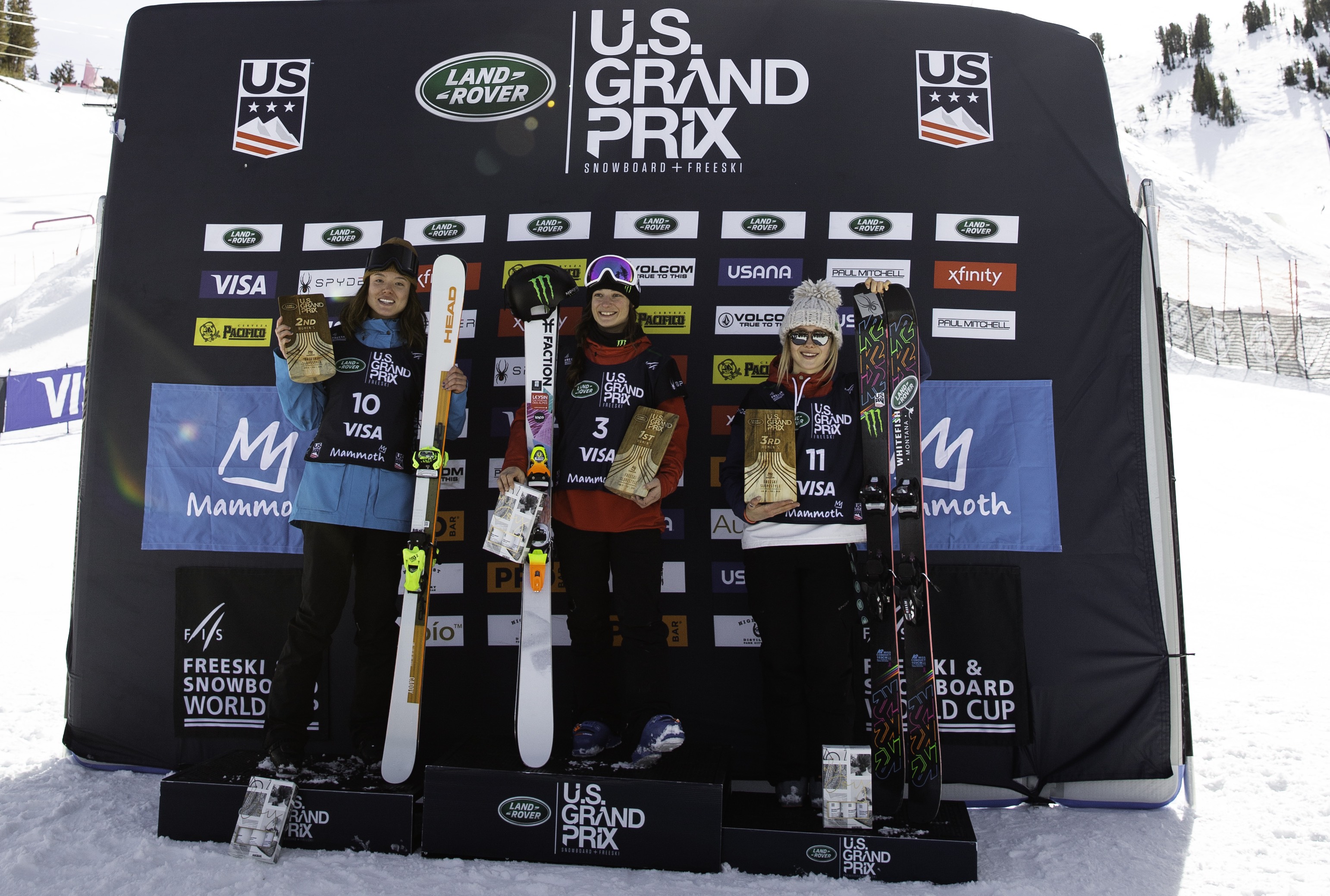 Isabel Atkin (left), Sarah Hoefflin (center), and Maggie Voisin on the freeski slopestyle podium at the Land Rover U.S. Grand Prix at Mammoth Mountain, Calif. (U.S. Ski & Snowboard - Sarah Brunson) Maggie podium