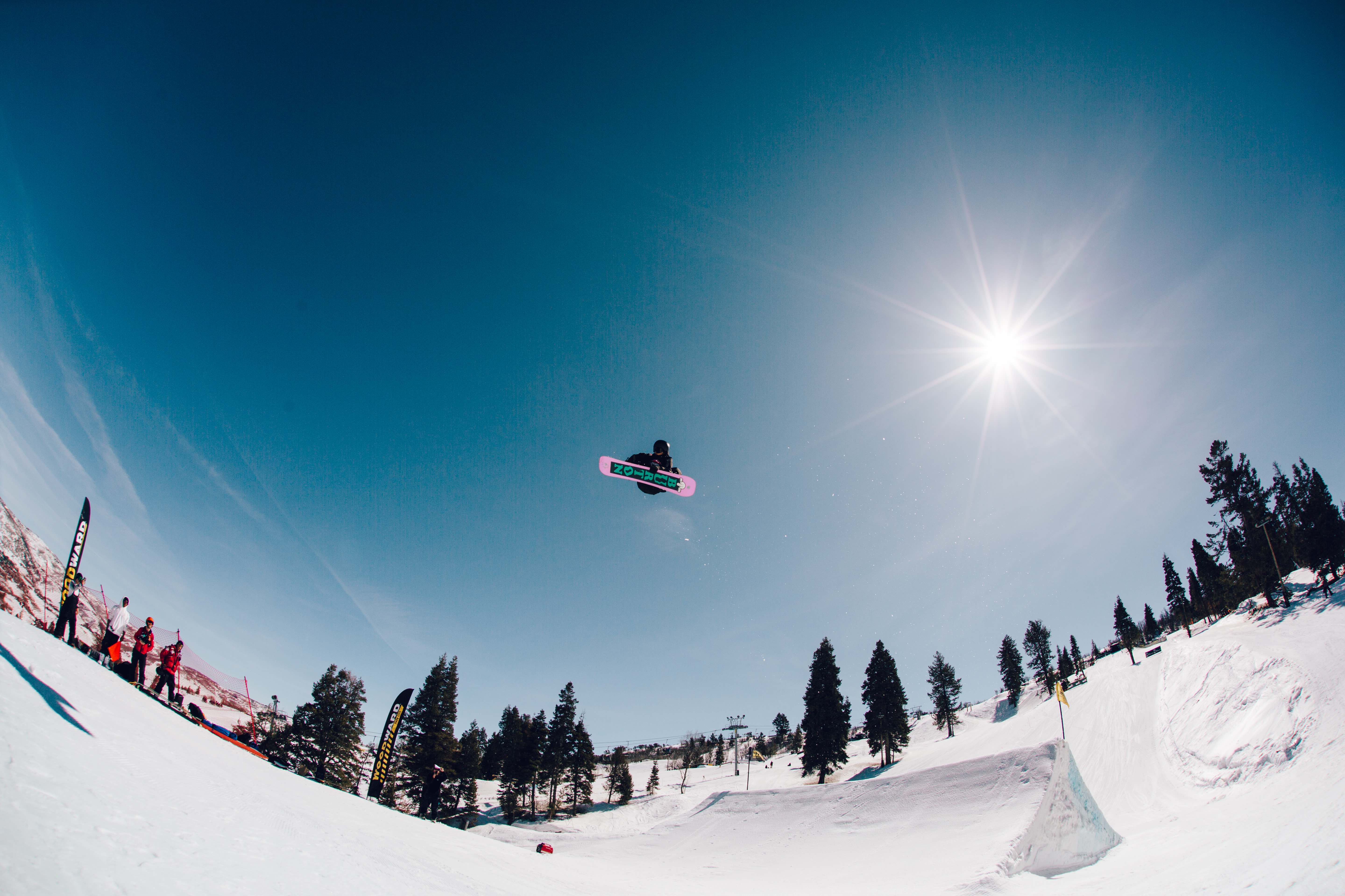 U.S. Rev Tour snowboard athlete airborne at Woodward Park City. (U.S. Ski & Snowboard - Sarah Brunson) snowboarder