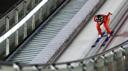 soared into Saturday’s large hill medal round in Friday night’s qualifying.