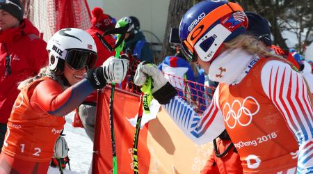 Lindsey Vonn and Ragnhild Mowinckel of Norway fist bump after the third training downhill training run Tuesday at Jeongseon Alpine Centre. (Getty Images - Alexander Hassenstein)