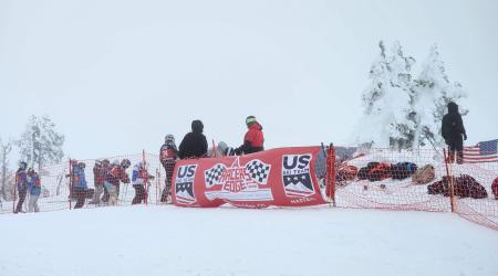 A Racer's Edge Banner at Top of Course 2023 Masters Nationals at Mt. Bachelor