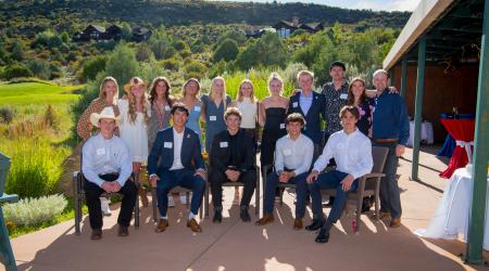 Moguls team members pose for a photo at their annual team fundraiser