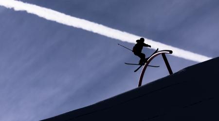 Mac Forehand skiing a rail