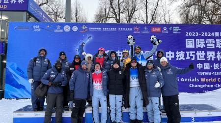 Stifel U.S. Freestyle Ski Team aerials athletes together on the podium after Winter Vinecki's win in Changchun