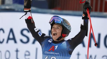 Lauren Macuga celebrates in the finish.