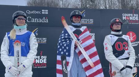 Karenna Elliott stands on the top box of the podium in Lac-Beauport, Canada.