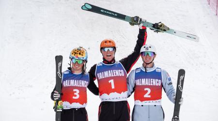 Connor Curran (right) smiles on the podium, finishing third at the 2024 Junior World Championships