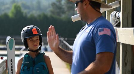 Vladimir Lebedev coaches a Project Gold participant in Lake Placid, New York