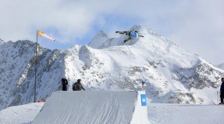 Hunter Henderson mid-air during slopestyle training in Stubai, Austria