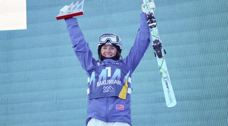 Jaelin Kauf smiles on the podium in Bakuriani