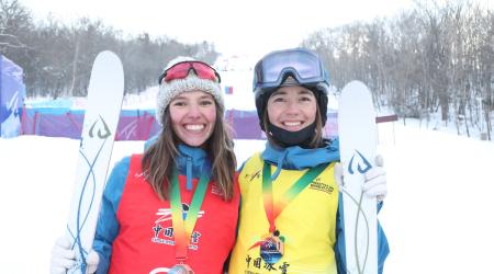 Jaelin Kauf and Tess Johnson smile after awards in Beidahu